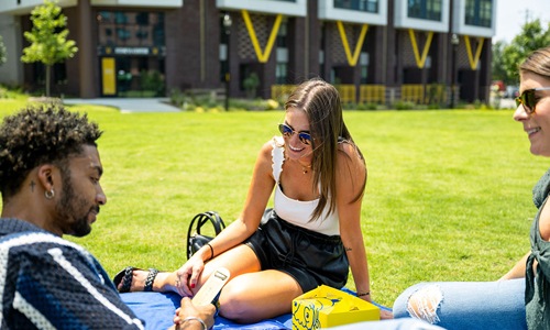 Friends enjoying eating outdoors