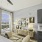 Decorated bedroom with large window and ceiling fan