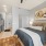 Studio apartment with large bed and closet